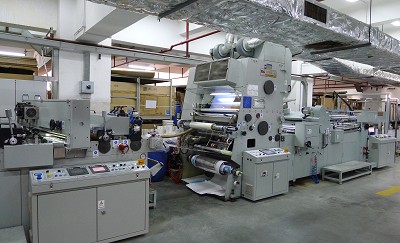 A close-look for three men checking a machine